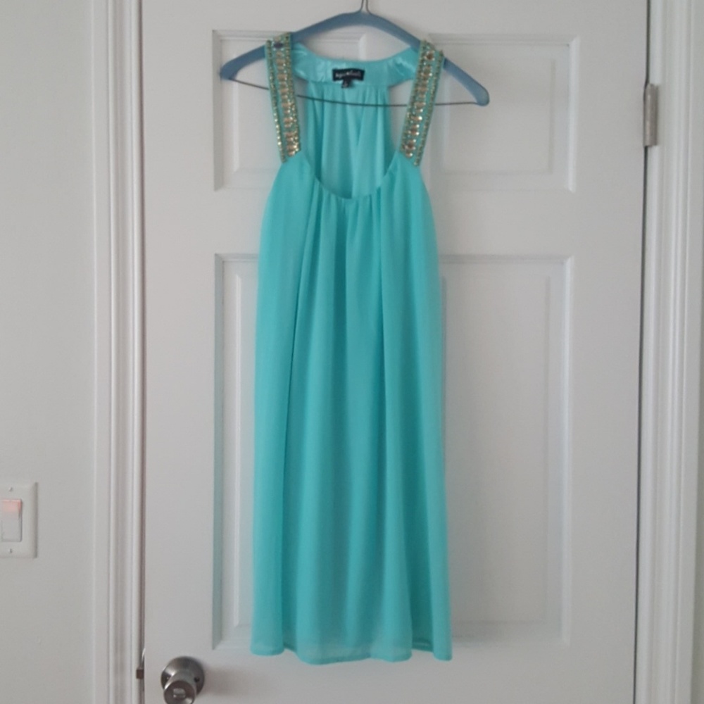 turquoise knee length dress.. Brand New